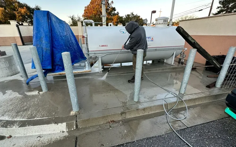 Pressure washing a fleet yard wash pad and concrete apron