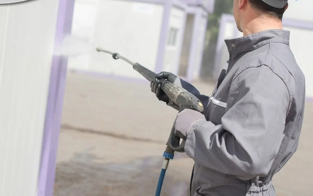 Soft-washing a stained wood fence clean